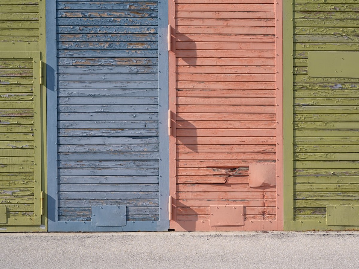 Three doors representing the three legal ways to get no-deposit electricity in Texas