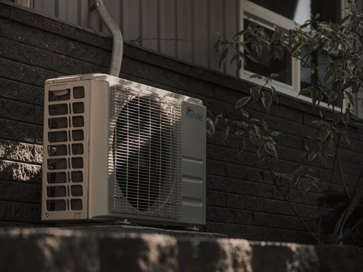 Air conditioner unit representing high summer electricity use in Texas households